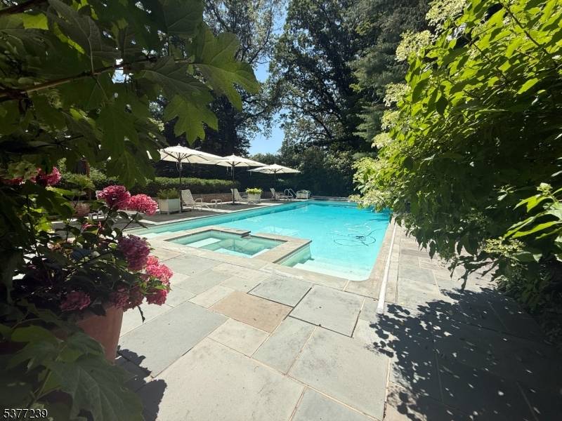 If you value privacy the serenity of nature, combined w the luxury of innovative contemporary design, this handsome stately 6BR, 4.