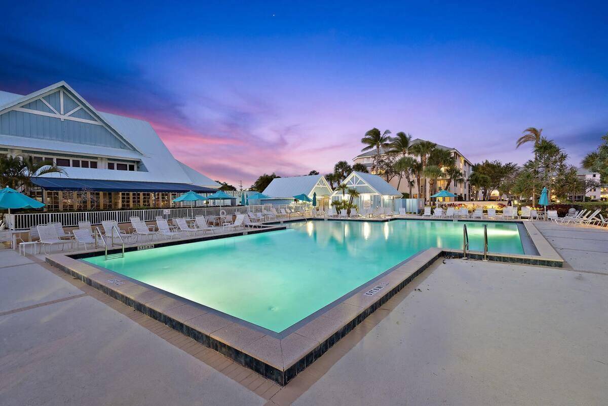 Rarely available first floor, no stairs, 2 bedroom 2 bath plantation villa in Jupiter Bay community is offered fully furnished, turnkey.