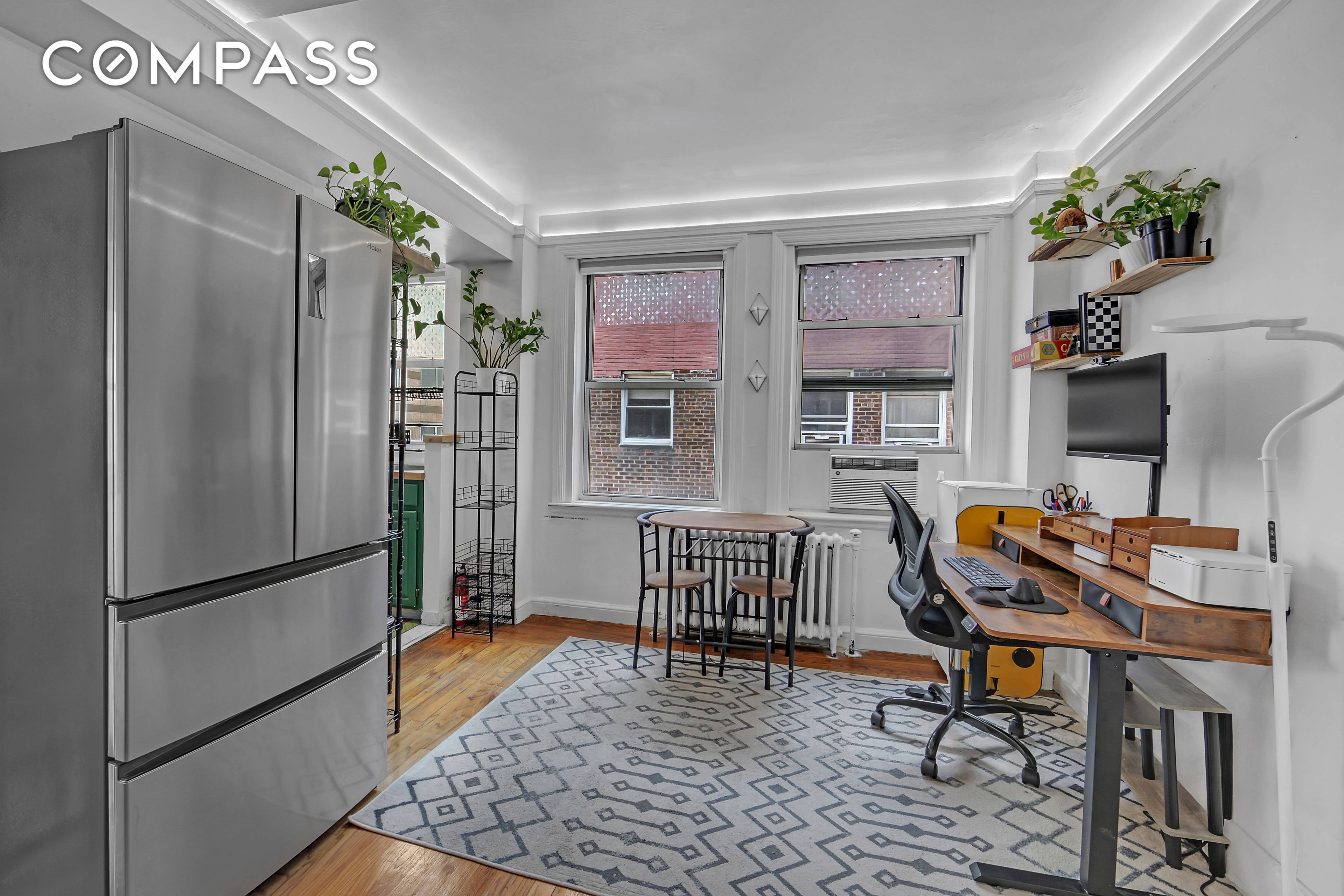 This one bedroom, one bathroom co op unit at The Manor boasts timeless elegance and modern functionality.