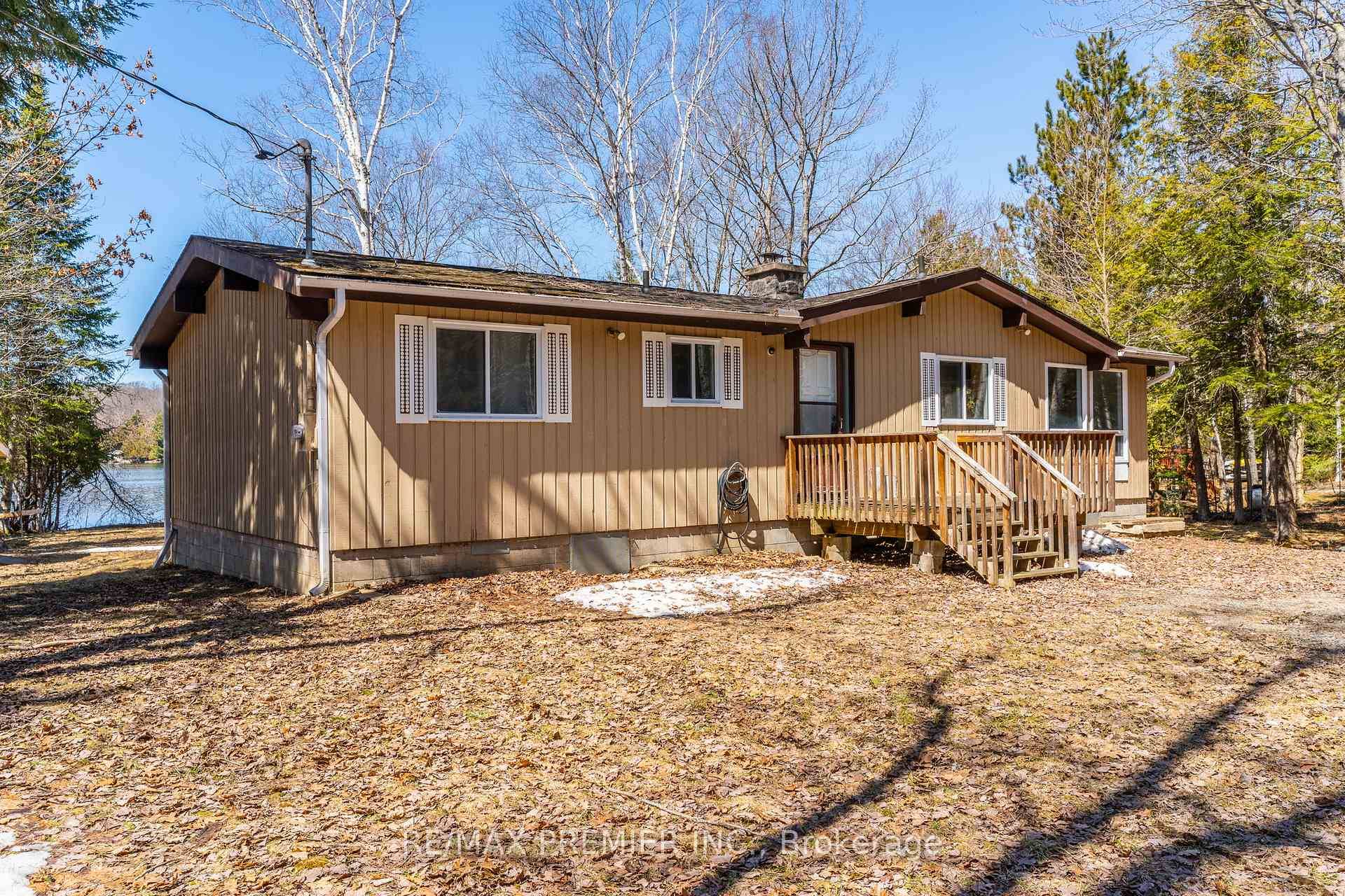 Cottage on Perfectly leveled lot on beautiful Canning Lake.