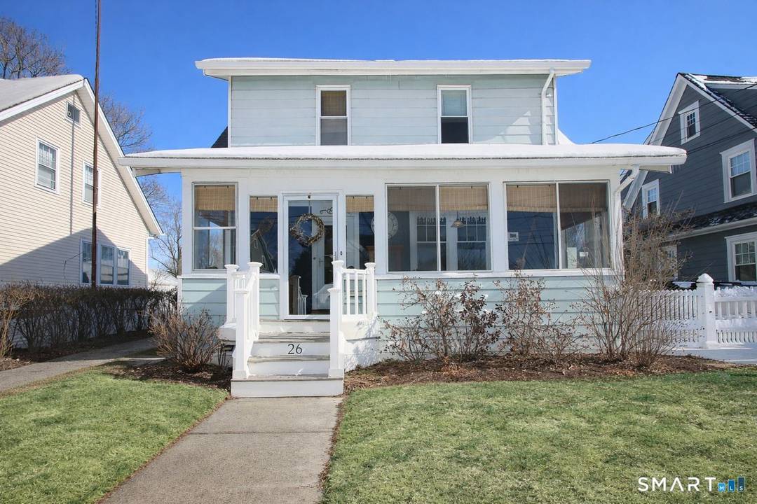 Charming and inviting Colonial home nestled on a beautiful tree lined street.