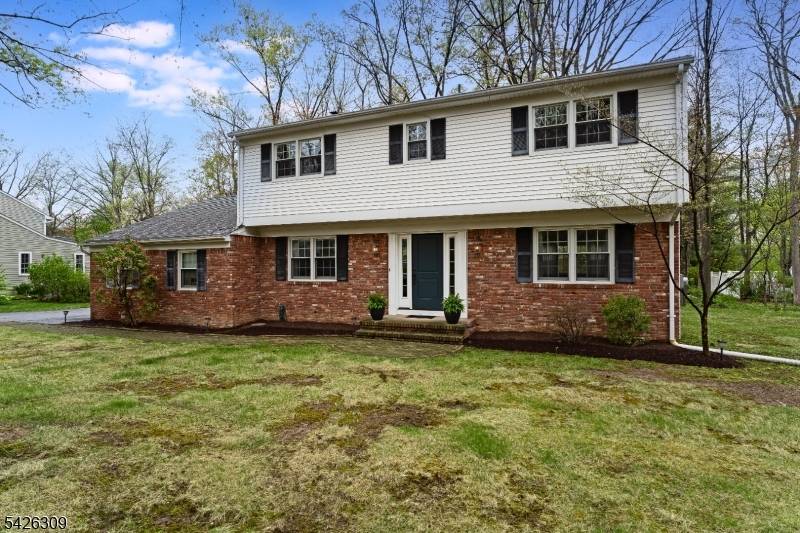 Traditional center hall colonial home on a lovely tree lined cul de sac street in a location offering easy access to the town community center, pool, and fields as well ...