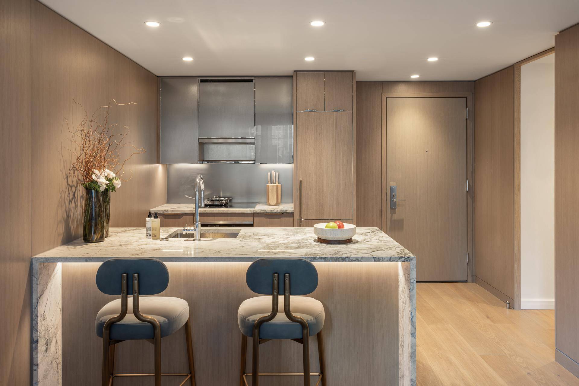 Immediate Occupancy This warm and cozy, 547 square foot, one bedroom, one bathroom residence designed by Thomas Juul Hansen, features an open living concept with floor to ceiling windows.