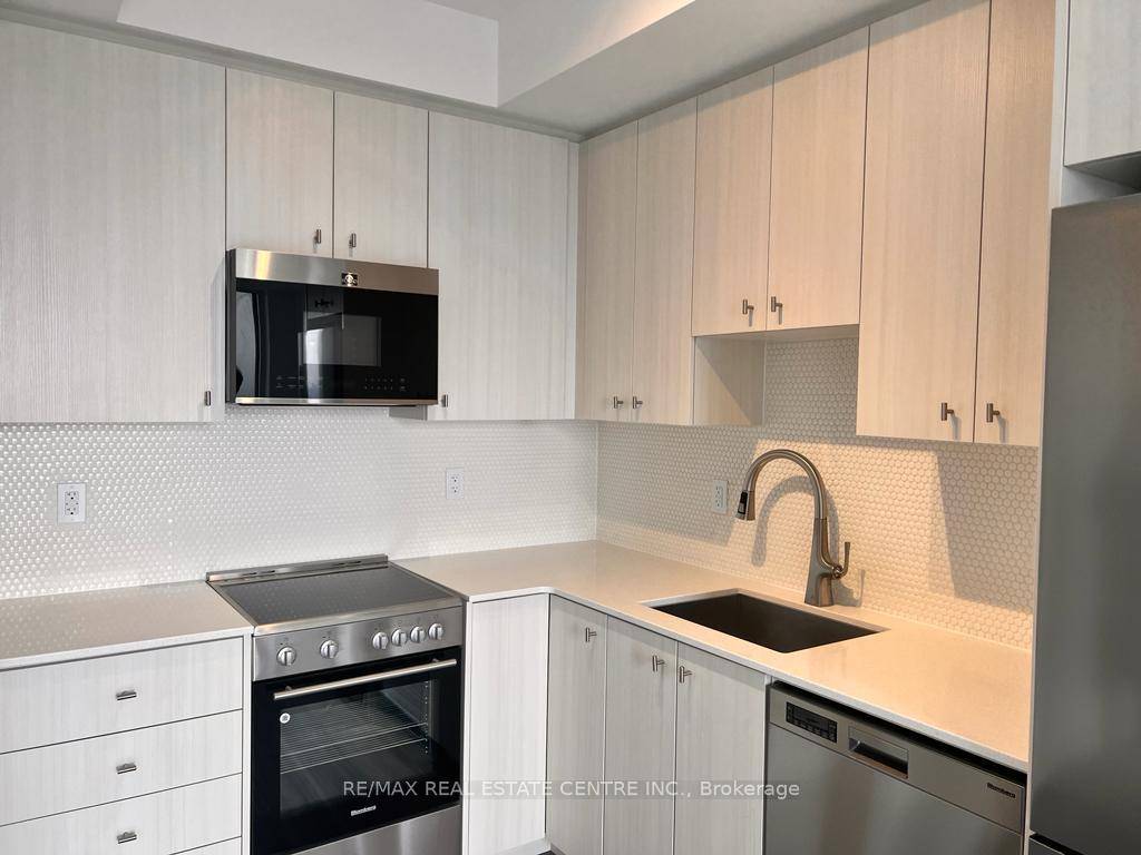 Spacious 1 bedroom den unit available for lease in Station Park.