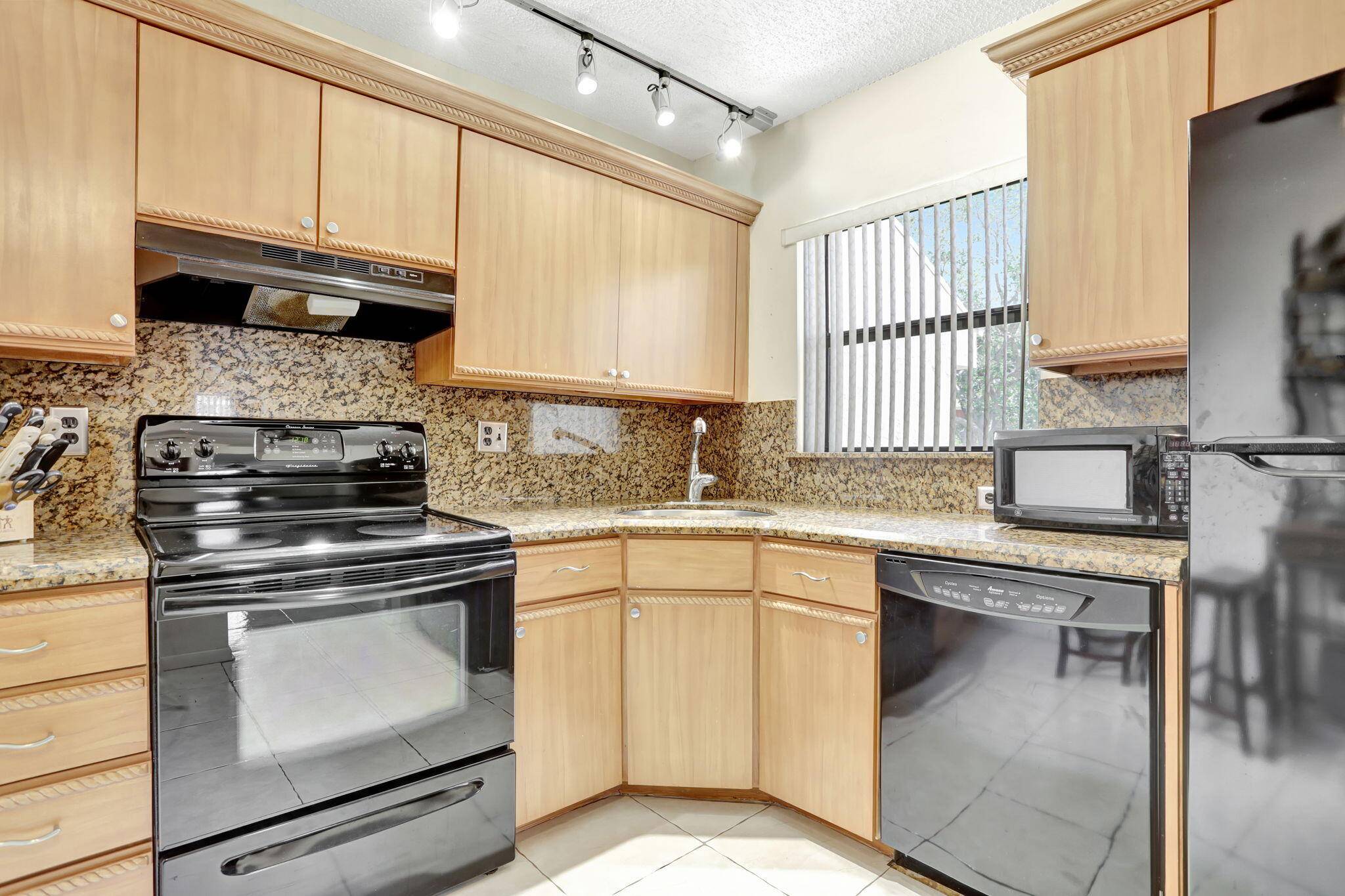 Nestled in the lushly landscaped Township community, this charming 2 bedroom, 2 bath second floor unit in Karanda VII overlooks the pool.