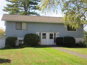 Attractive split level townhouse with 2 bedrooms and 1.