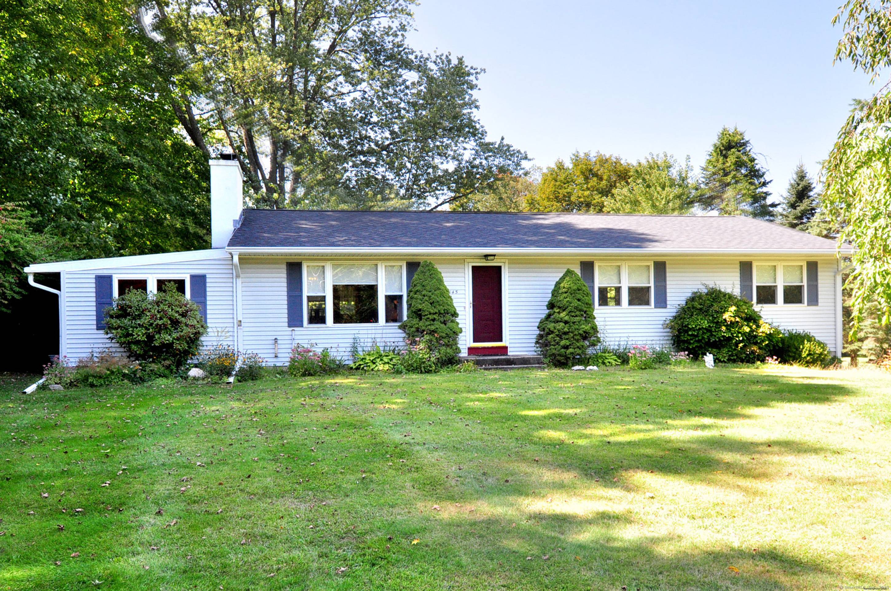 Charming one level living in a beautiful setting.