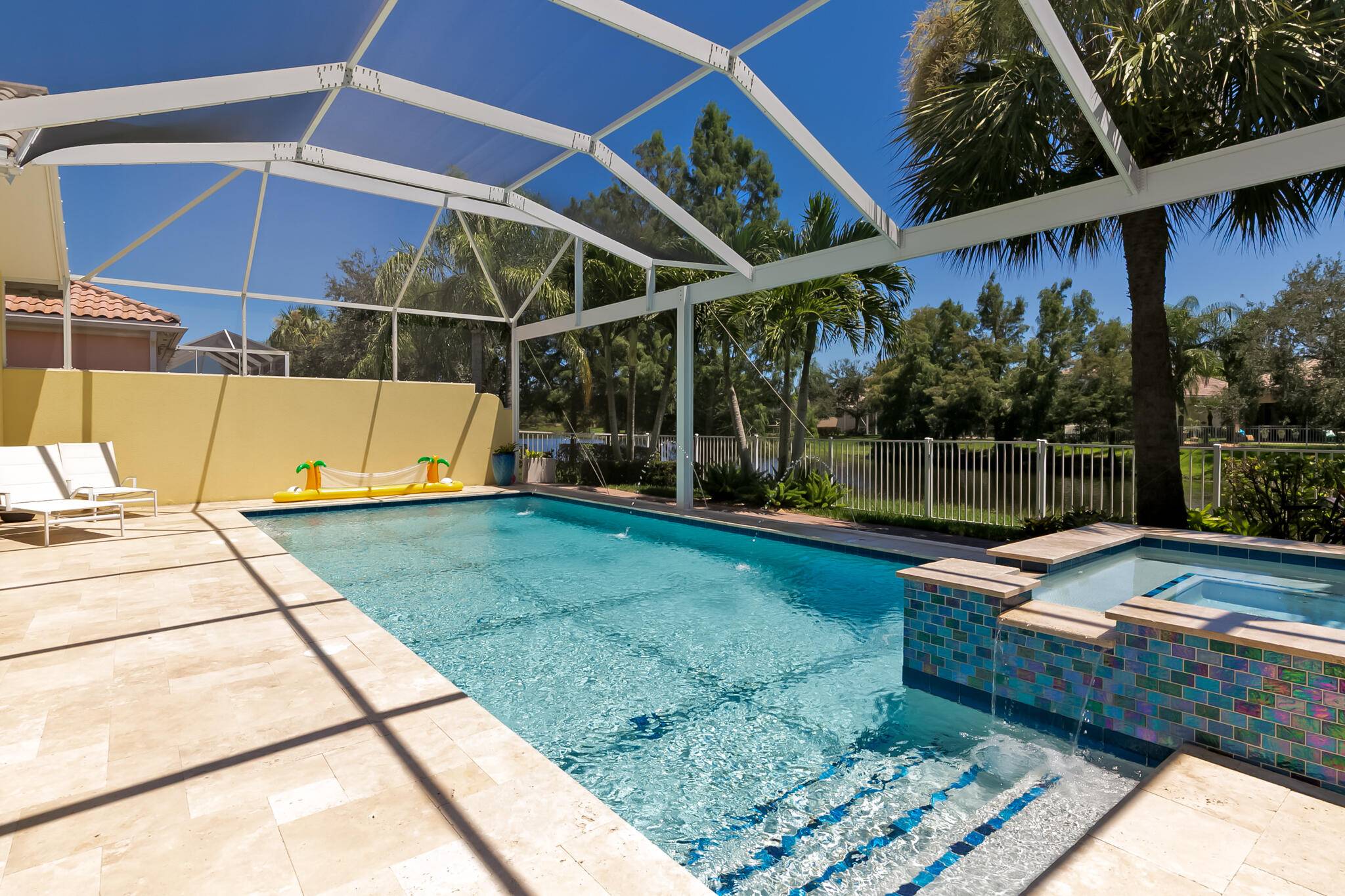 The owners have transformed this peaceful lakefront retreat into their own private paradise.