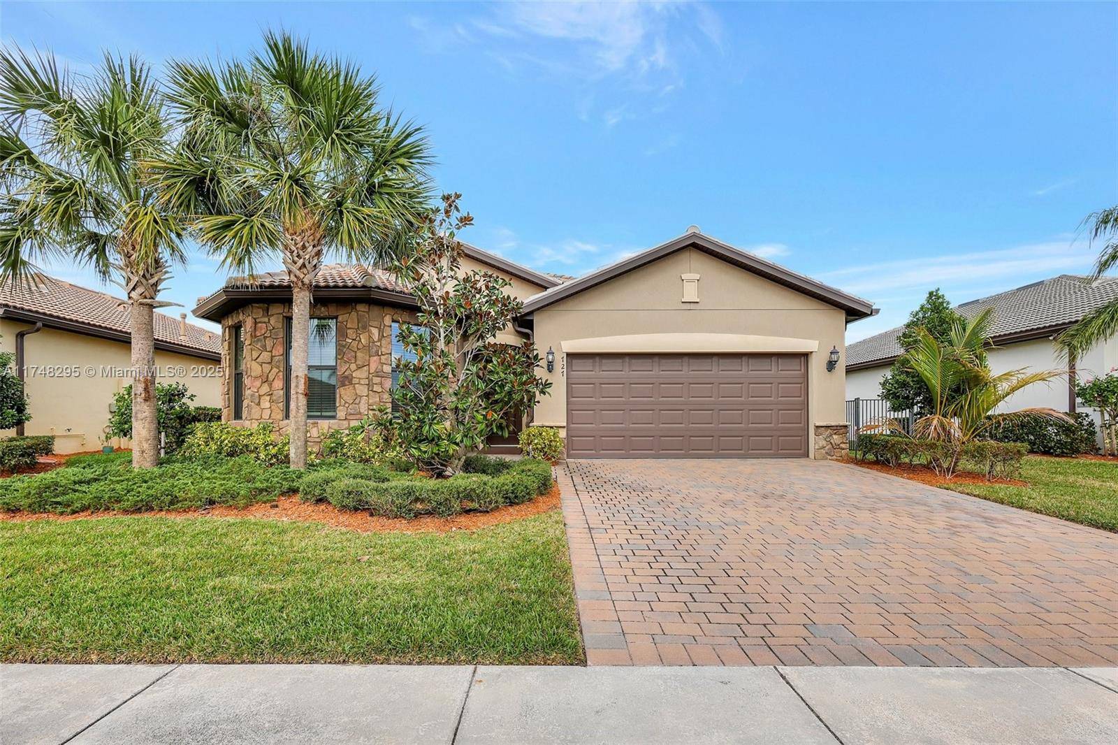 Live the Florida lifestyle in this stunning lakefront home in the gated Veranda Gardens community !