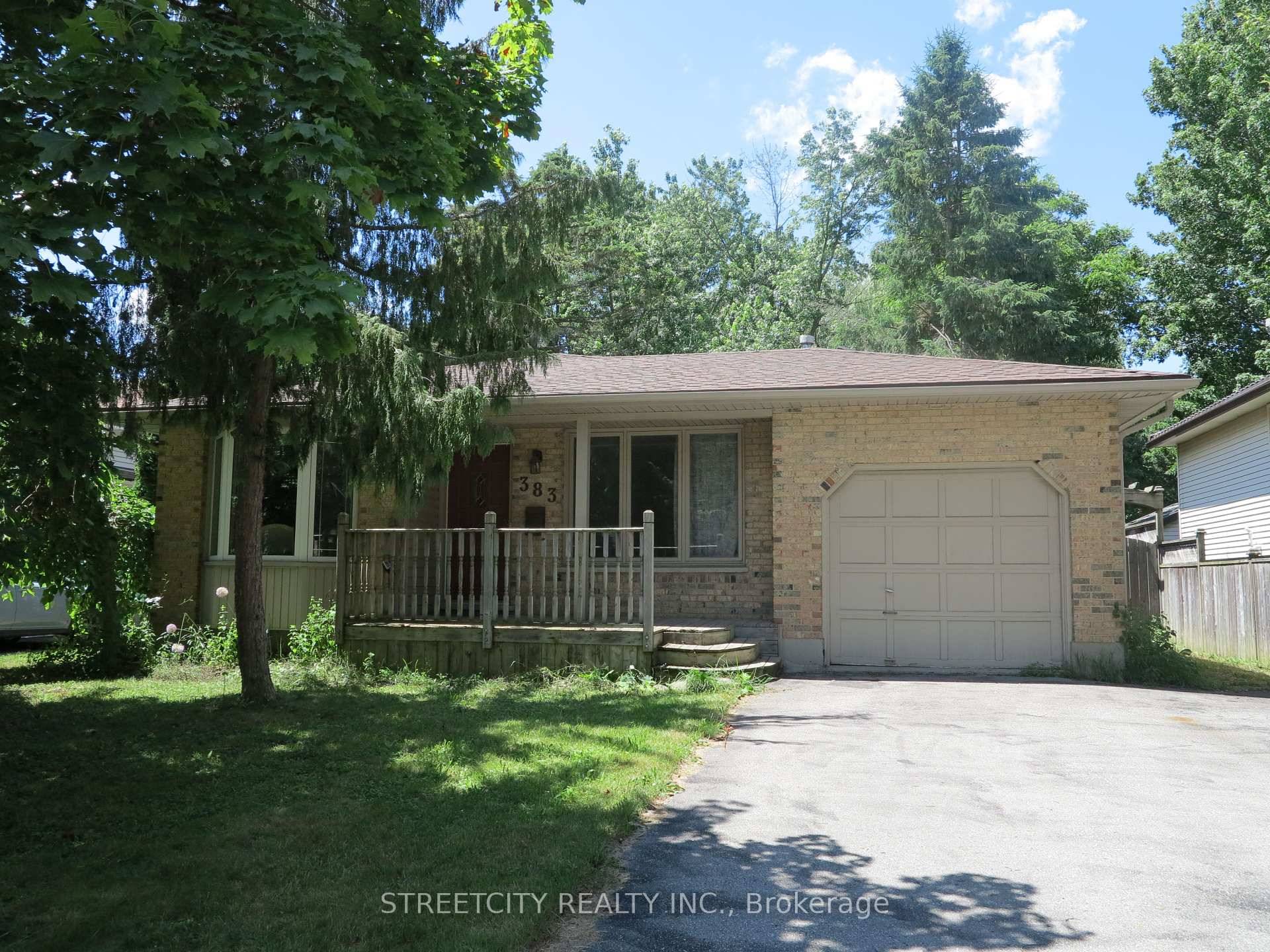 Spacious 3 2 bedroom backsplit home featuring 2 full bathrooms, 2 half bathrooms, and open concept kitchen.