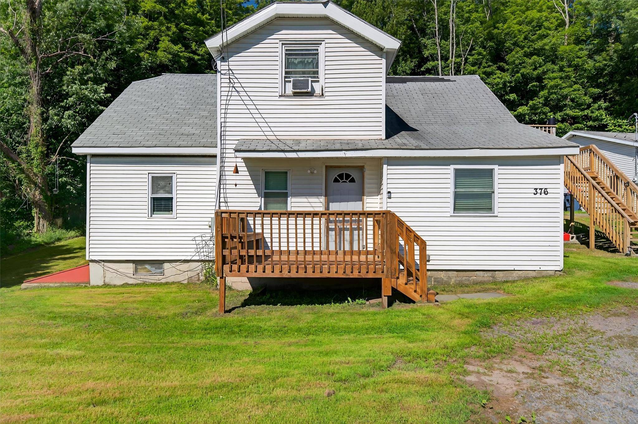 Opportunity knocks with this well maintained and upgraded 2 family home featuring a spacious workshop garage perfect for hobbyists, car enthusiasts, or those in need of serious storage and work ...