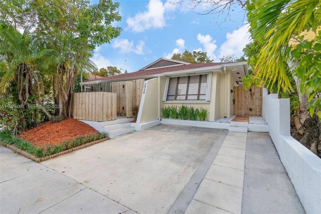 Fully upgraded and move in ready 2 bedroom, 2 bath half duplex in highly desirable Coconut Grove.