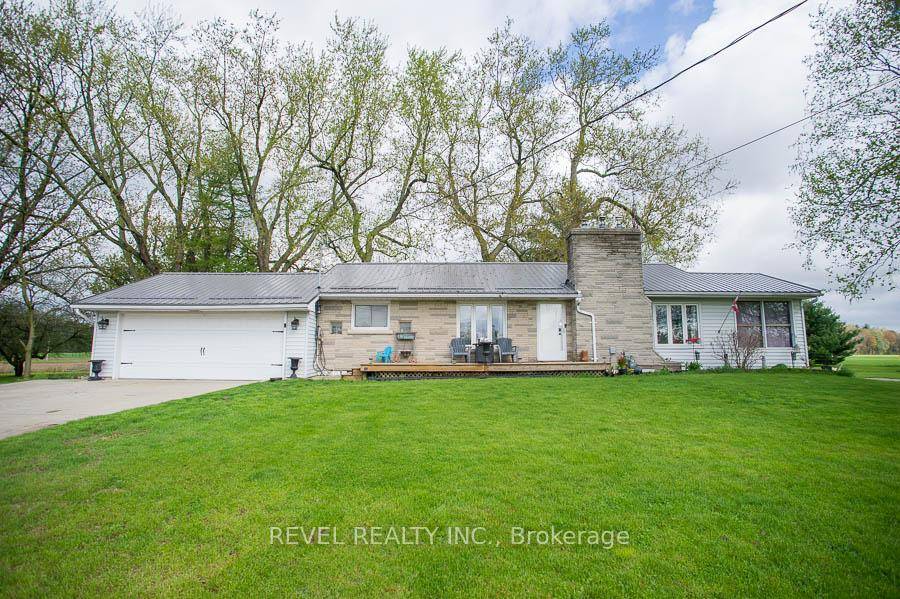 Welcome to 1039 St. Johns Road W a charming bungalow nestled on a picturesque 2 acre lot in beautiful Norfolk County.