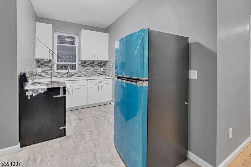Just hit the market ! This fully renovated 2024 3 family home is the perfect blend of modern living and prime location.