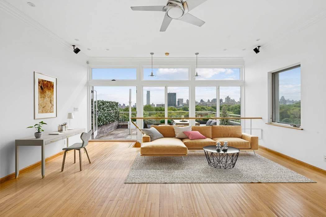 Sun splashed corner duplex with terrace !
