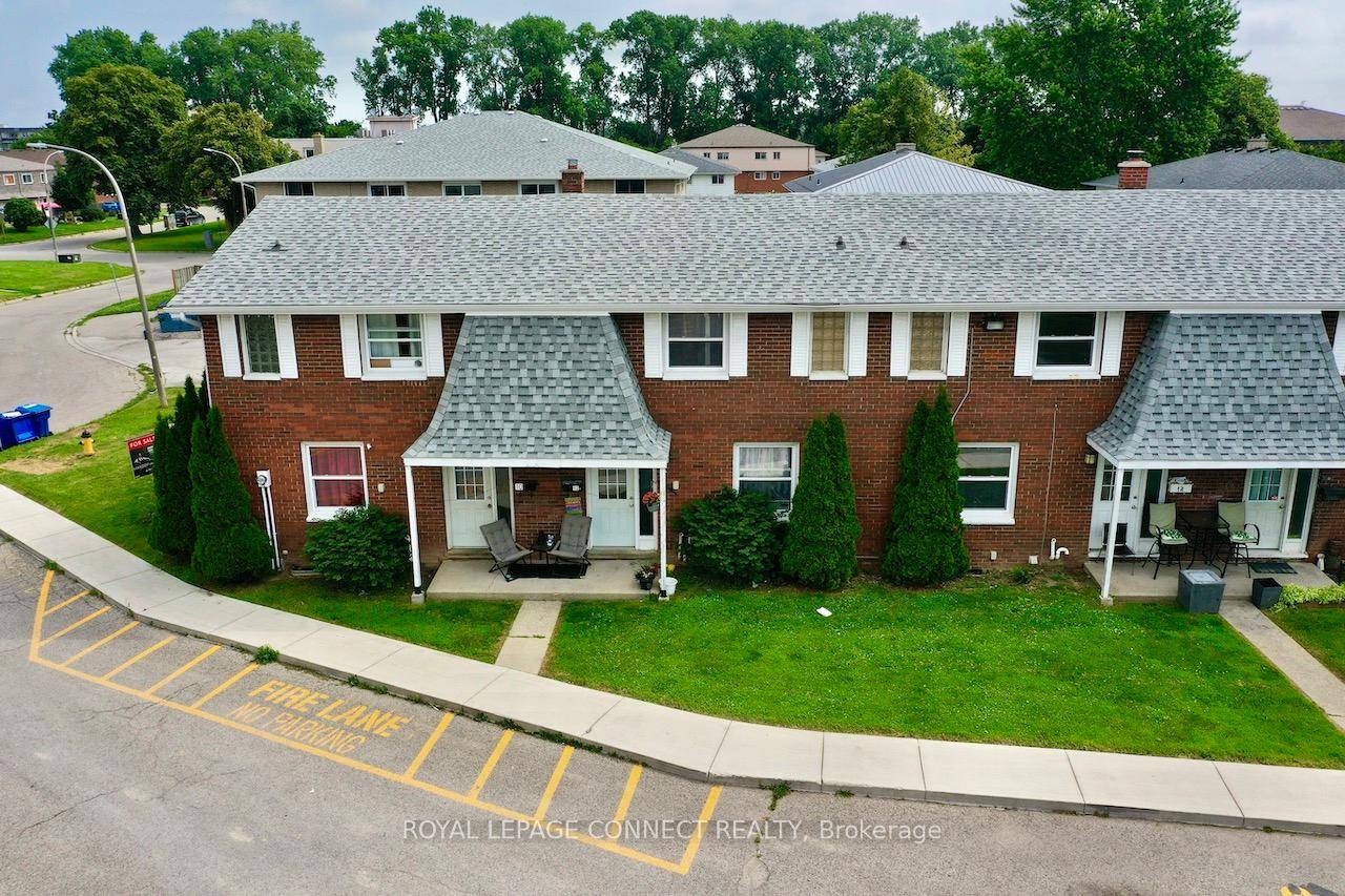 All brick centrally located well established 2 storey, 3 bedroom, 2 washroom condominium townhome with own exclusive parking, and sizeable useable unfinished basement, laundry area, and gas forced air heating.