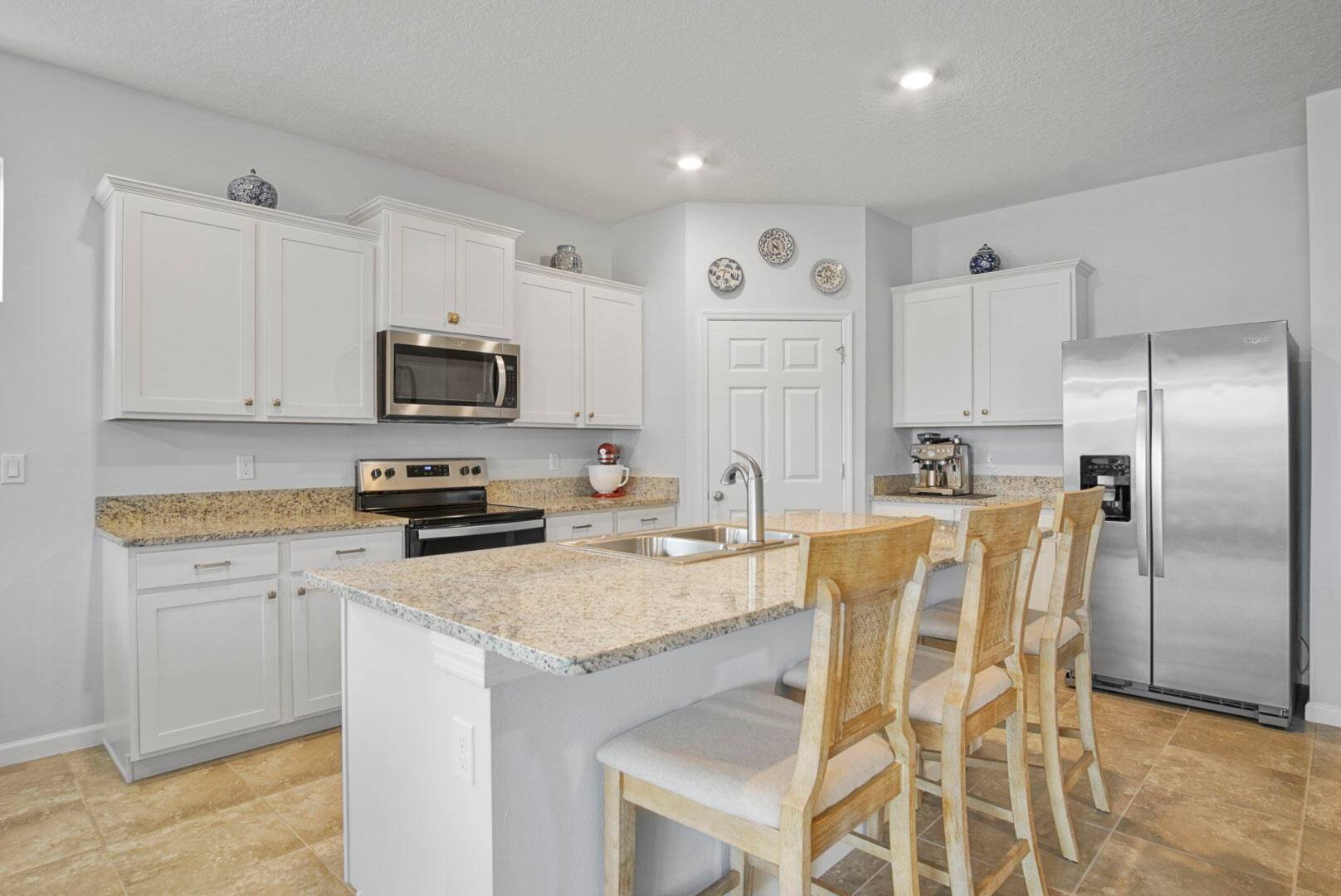 Discover this beautifully cared for 4 bedroom, 2 bath home in the heart of Tradition close to everything you need.