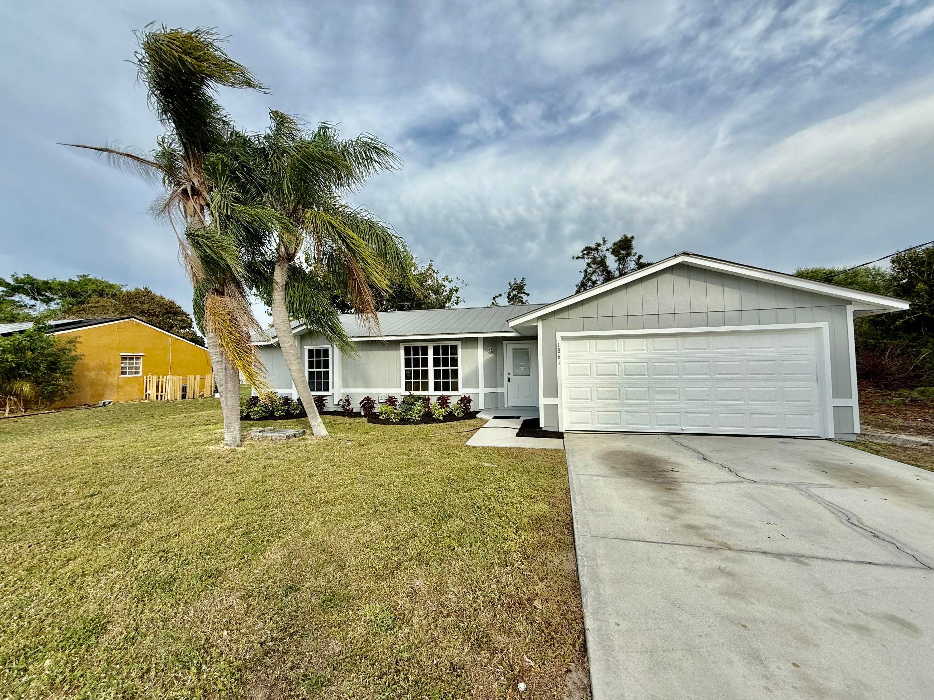 Welcome to this 3 bedroom 2 bath home that is perfectly situated on a Quiet street east of US1, mins to downtown Jensen Beach, Rivers, Beachs and so much more.