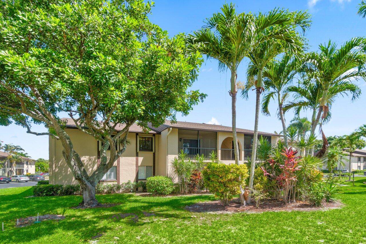 Step into this charming two bedroom two full bath home surrounded by garden views.