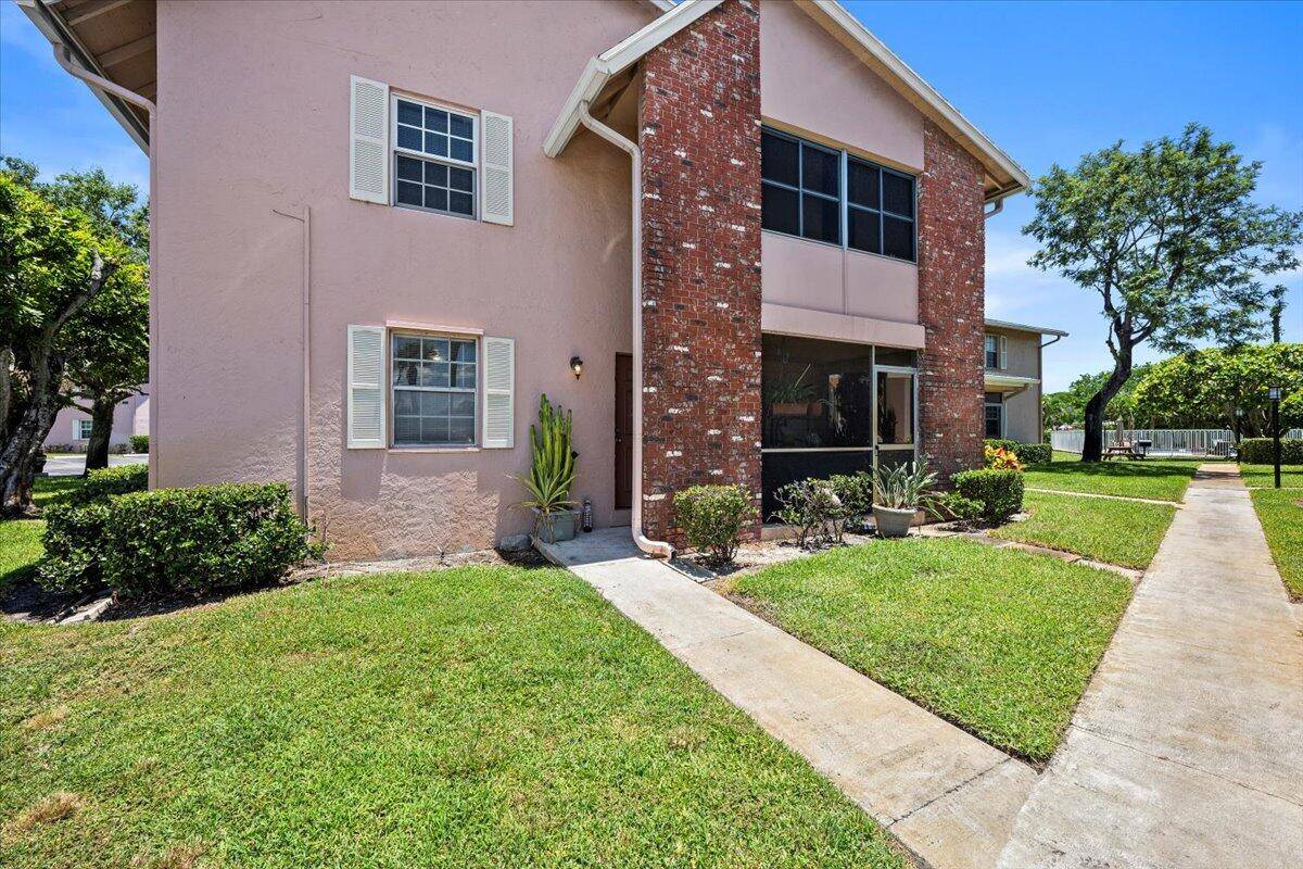 Introducing a rarely available ground floor 2 bedroom 2 bathroom condominium in Country Village !