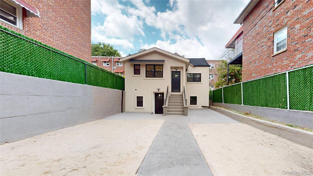 Welcome to this fully renovated single family duplex in the heart of Canarsie, offering separate private entrances for each level ideal for multigenerational living.