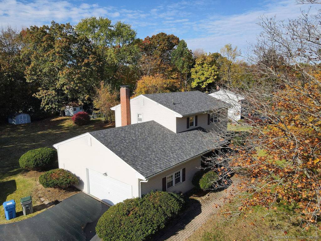 Welcome to 128 Pond Lane, a charming and well maintained home located in a quiet neighborhood of Manchester, Connecticut.