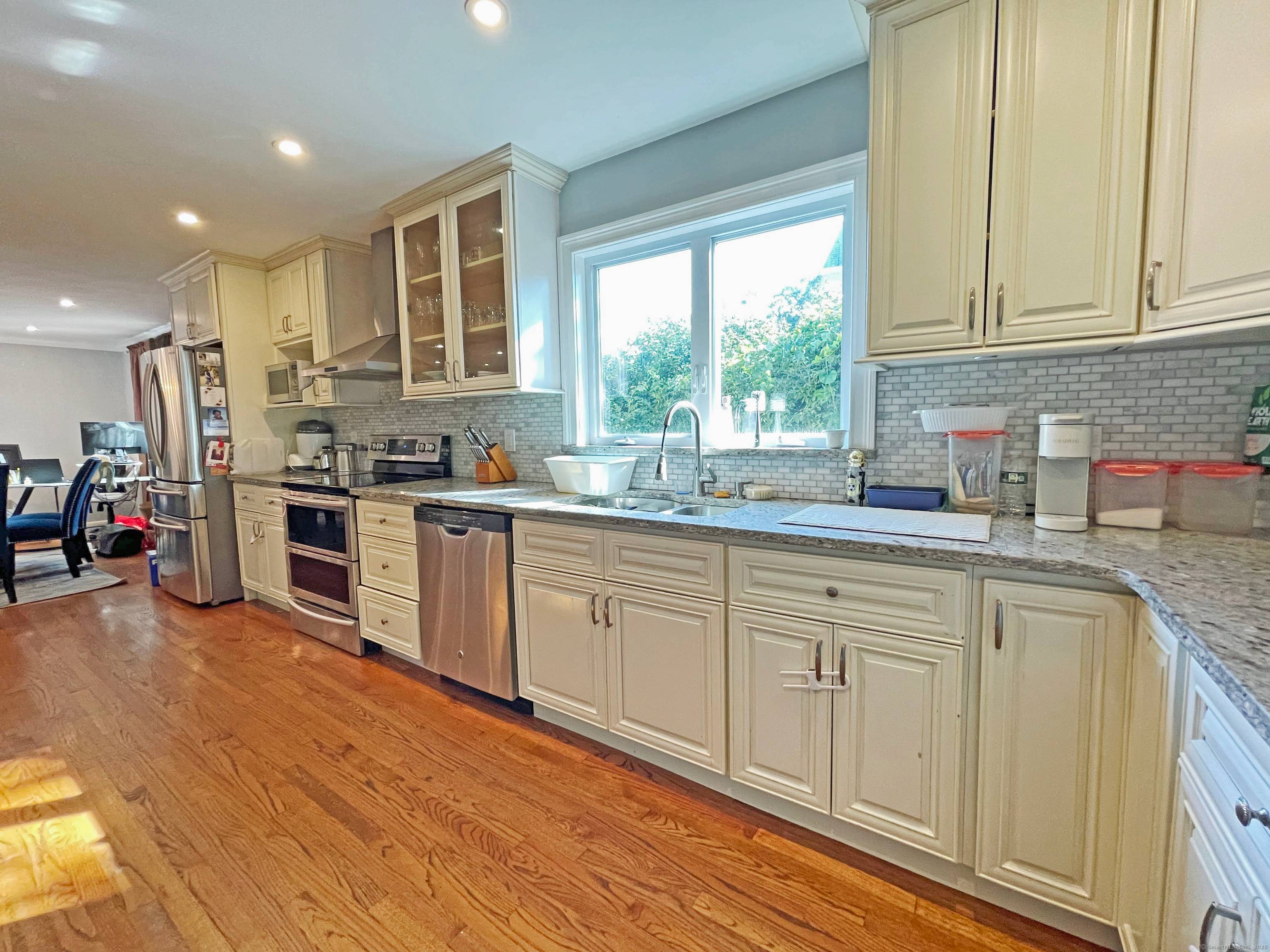 A Must See Gem only 1 mile from Sacred Heart University Don't miss this beautifully updated, move in ready home that truly has it all including a sparkling pool !