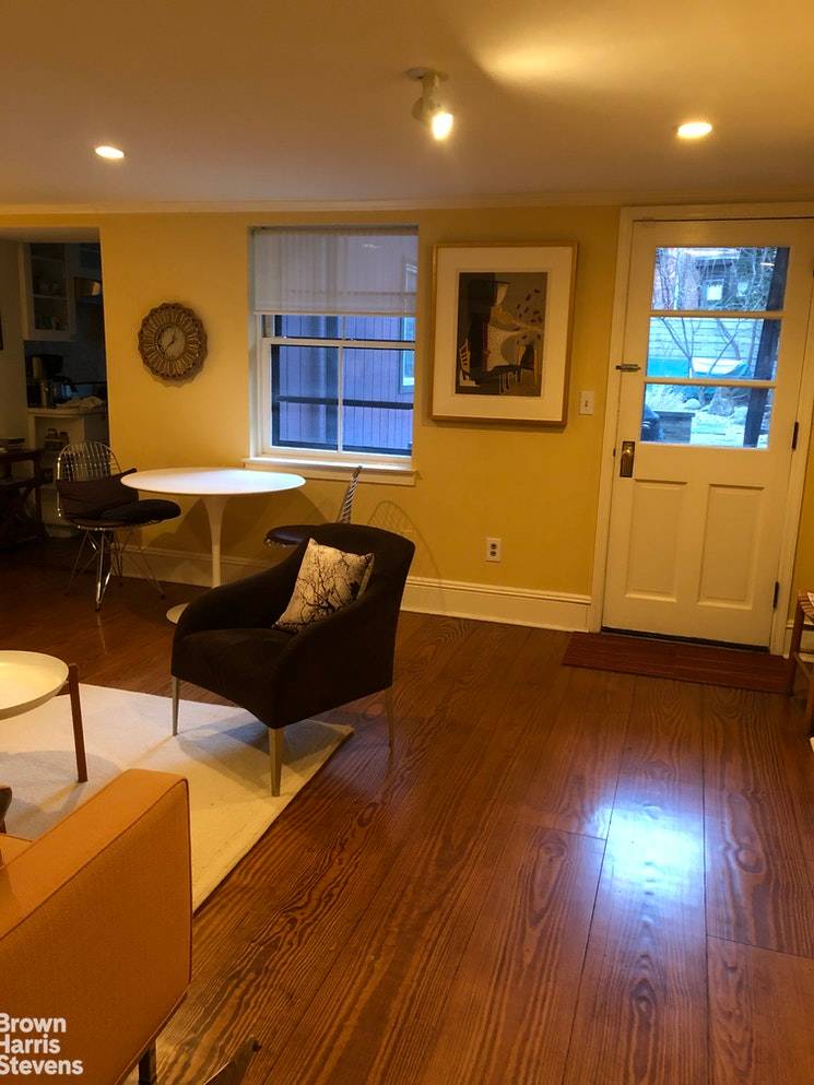 The garden apartment in this quaint and charming townhouse is elegant, tasteful, will make you feel right at home.