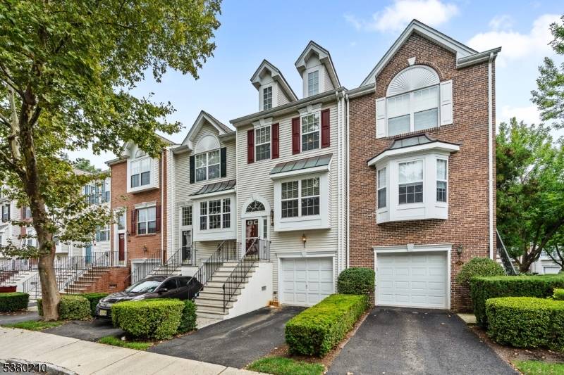 Nestled within the prestigious, gated community of Cambridge Heights, this freshly painted tri level townhome offers an exquisite blend of space and convenience.