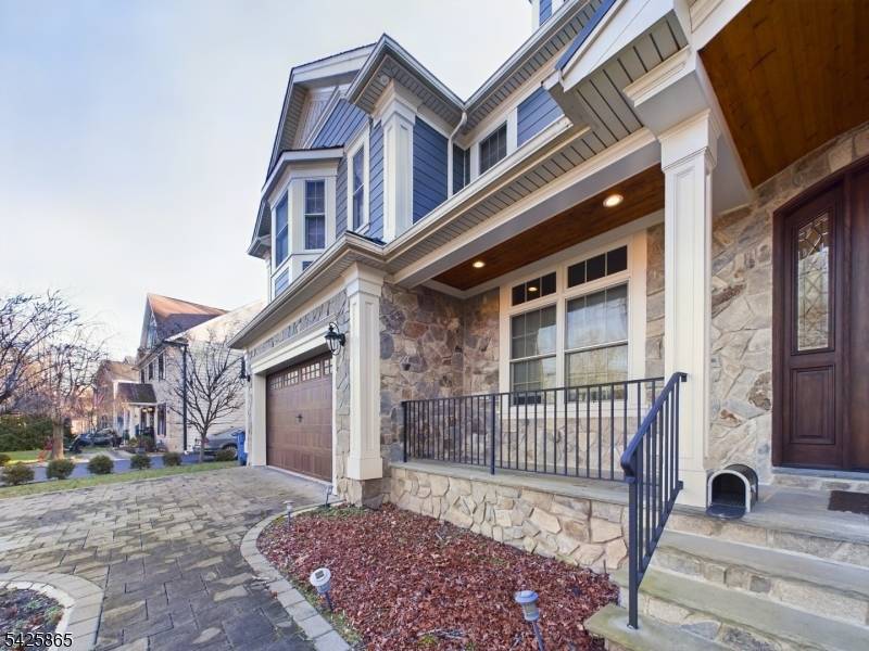 Stunning Luxury Estate Exceptional Design Prime Location 5 bed, 5 bath residence w a dedicated office offers approx.