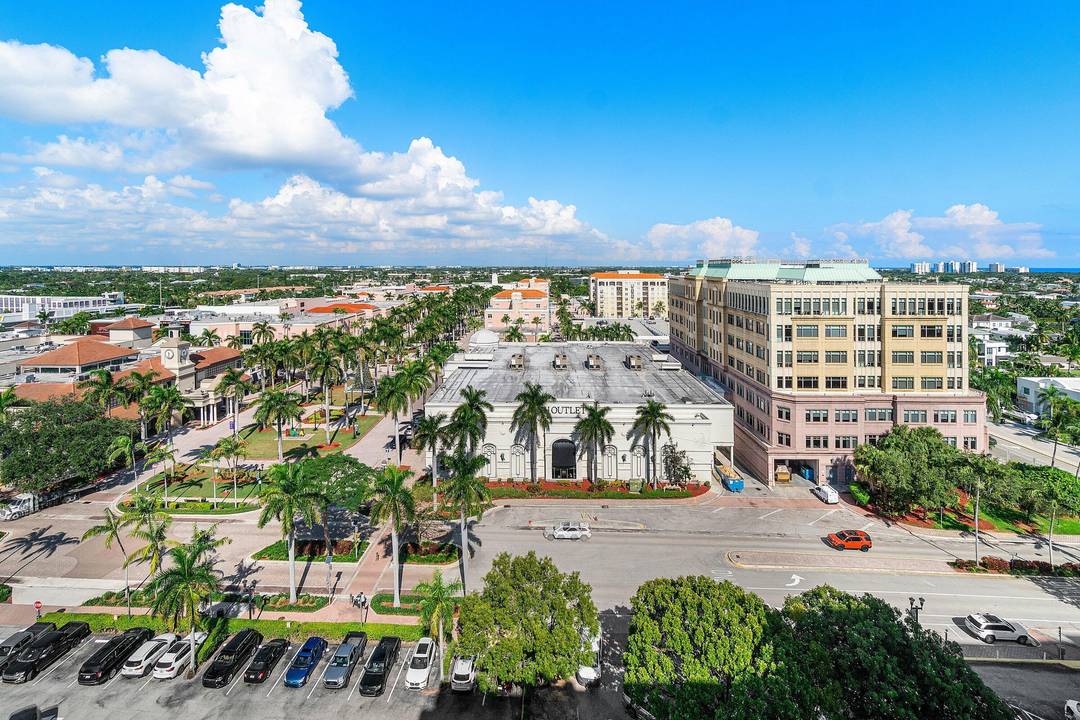 Experience captivating northeast ocean and sweeping northwest city views from this impeccably appointed 11th floor corner residence in the heart of downtown Boca Raton.