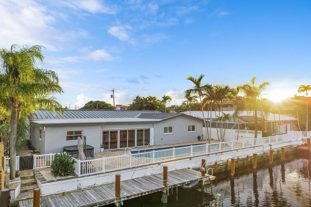 Welcome to your Ultimate Waterfront Oasis in Premier Coral Ridge Isles !