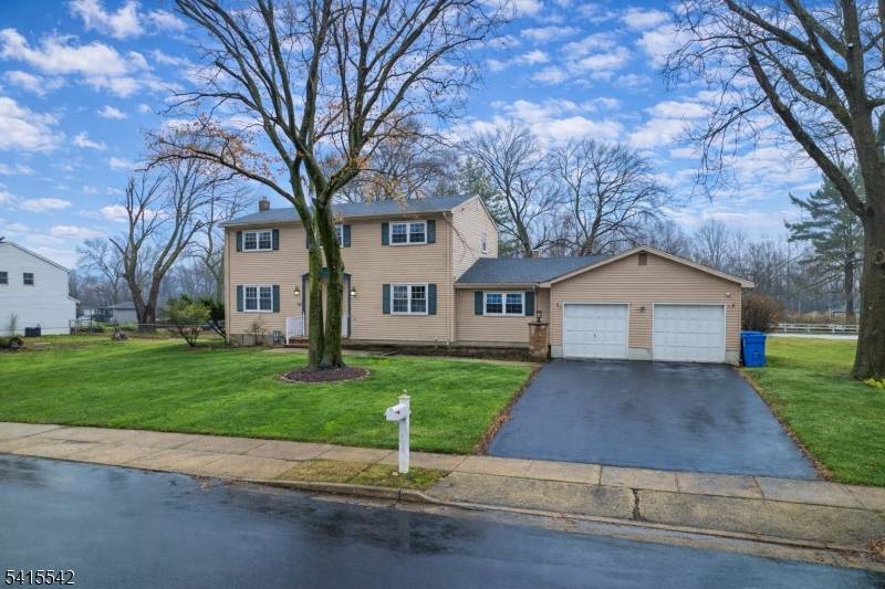 Elegant 4 bedroom, 2. 5 bath center hall Colonial in a sought after neighborhood offering space, function, classic style.
