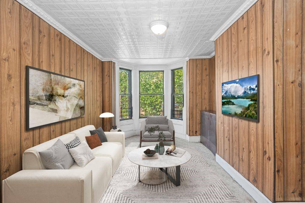 This beautifully preserved turn of the century 2 family townhouse is located in the heart of Sunset Park.