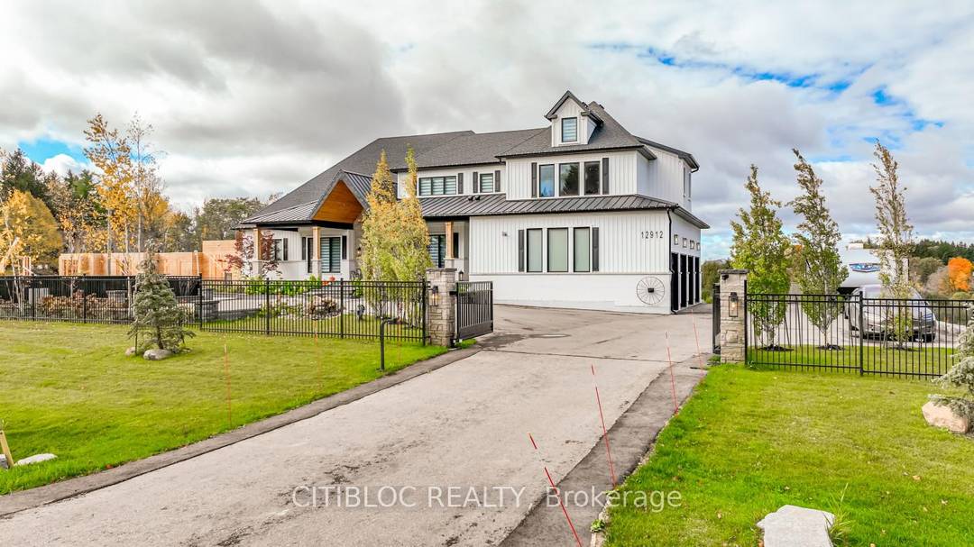 Welcome to this beautiful, gated countryside property This property is surrounded by lush trees and protected lands.