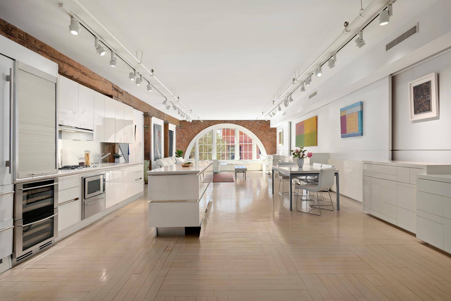 A SoHo Loft That Redefines Timeless This massive, light filled loft is pure New York romance where historic charm meets modern refinement in the heart of SoHo.