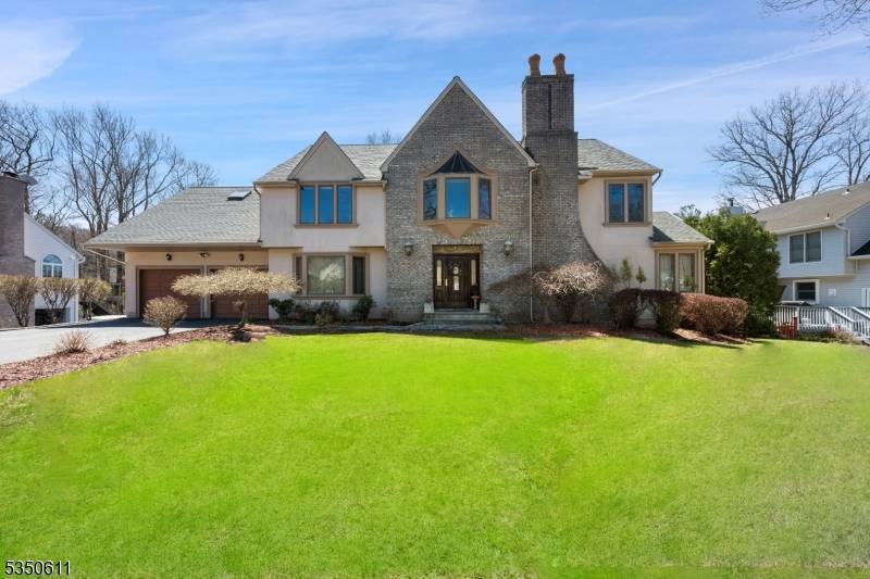 Welcome to 39 Lenox, a spacious, sunlit Colonial with exceptional features !