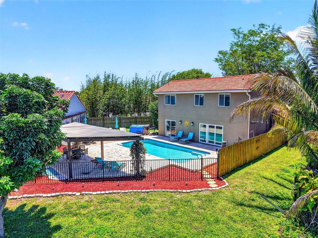 Experience elevated lakefront living in this beautifully updated home in the sought after Country Fair community of Boynton Beach.