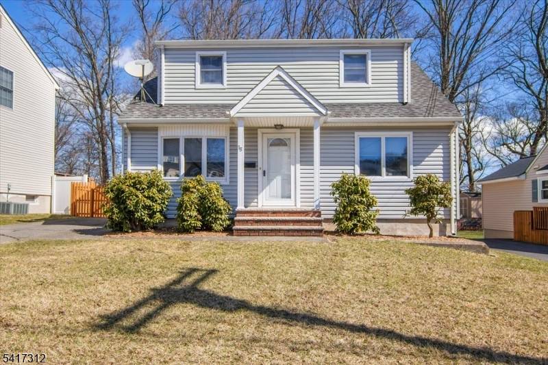 Impressive expanded Cape Cod home offers oversized primary BR expansion with double closets, formal living dining rooms w HW floors newly renovated kitchen w abundant Maple cabinetry, side island for ...