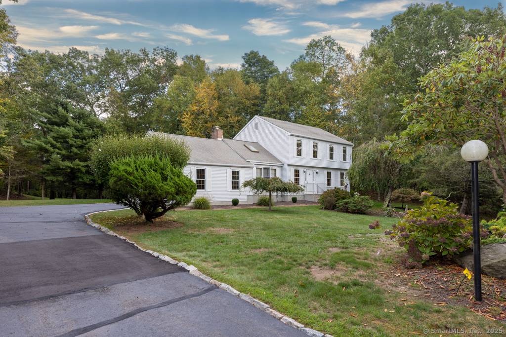 Privately set on over 2. 5 acres with mature landscaping, this home offers comfort and convenience.