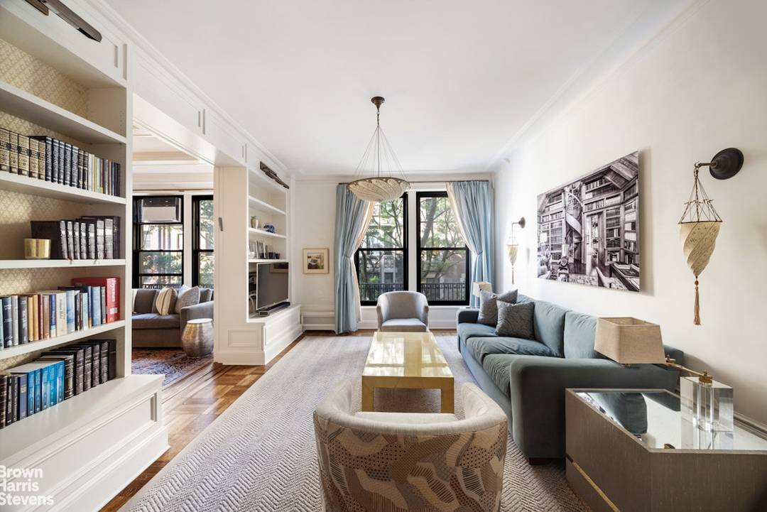 A gracious, turn of the century corner residence offering three spacious bedrooms and a dedicated home office, all within a full service building in a prime Upper West Side location.