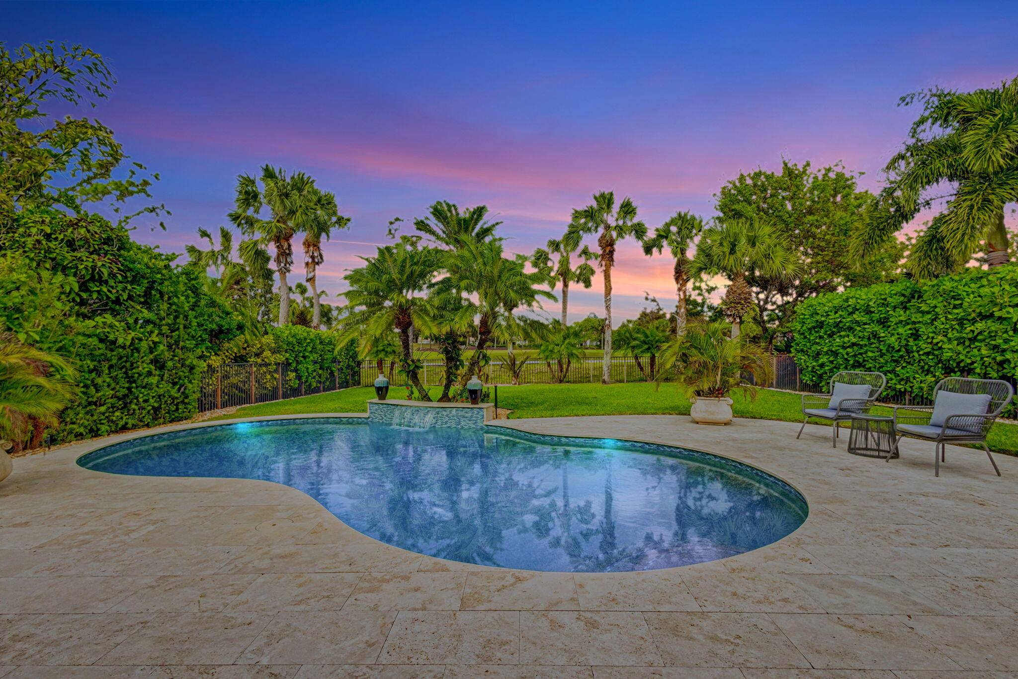 A Rare GOLF Membership in Mirasol Country Club with this modern renovated home offering quality finishes, spacious patio and private yard.