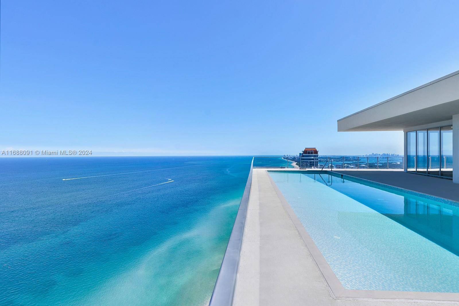 Step Inside With Me ! This magnificent three story oceanfront penthouse offers a private roof top with 59' infinity edge pool.