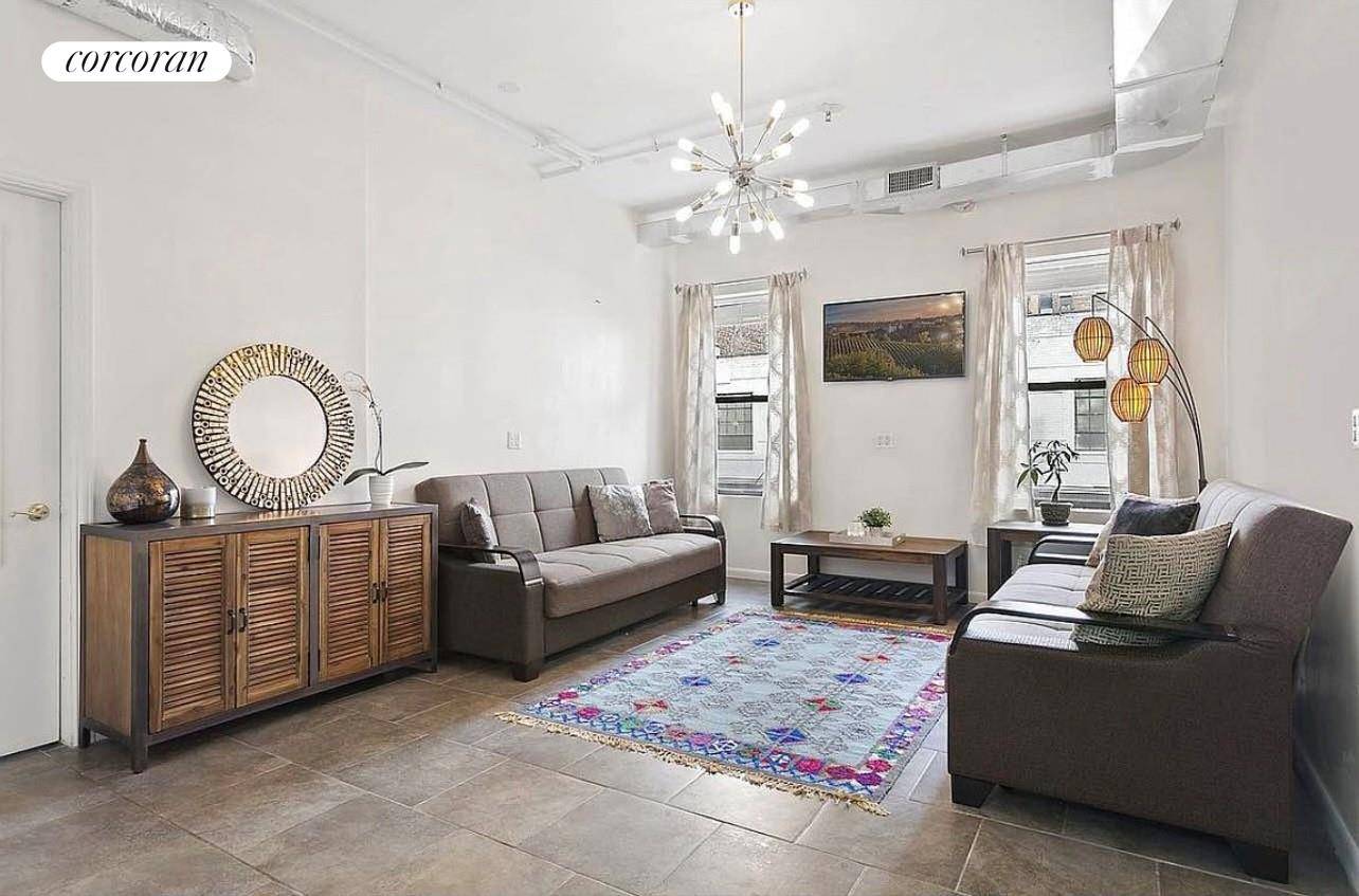One bedroom apartment in Manhattan's Clinton Theater District with elevator and spectacular common roof deck with extensive plantings, seating areas and grill.