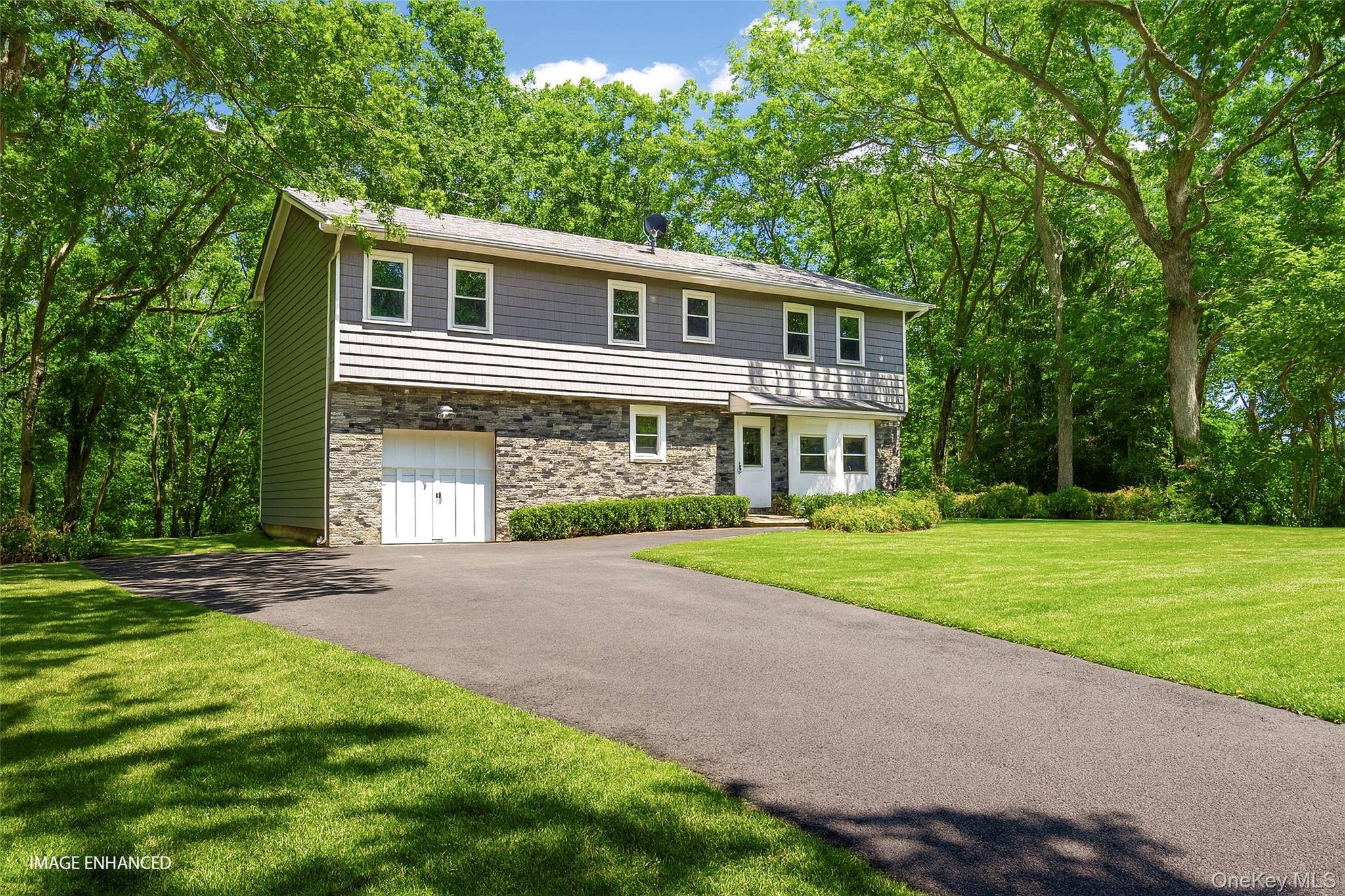 Tucked away at the end of a serene cul de sac, just moments from the charming boutiques and restaurants of Main Street, this property offers the perfect blend of Hamptons ...