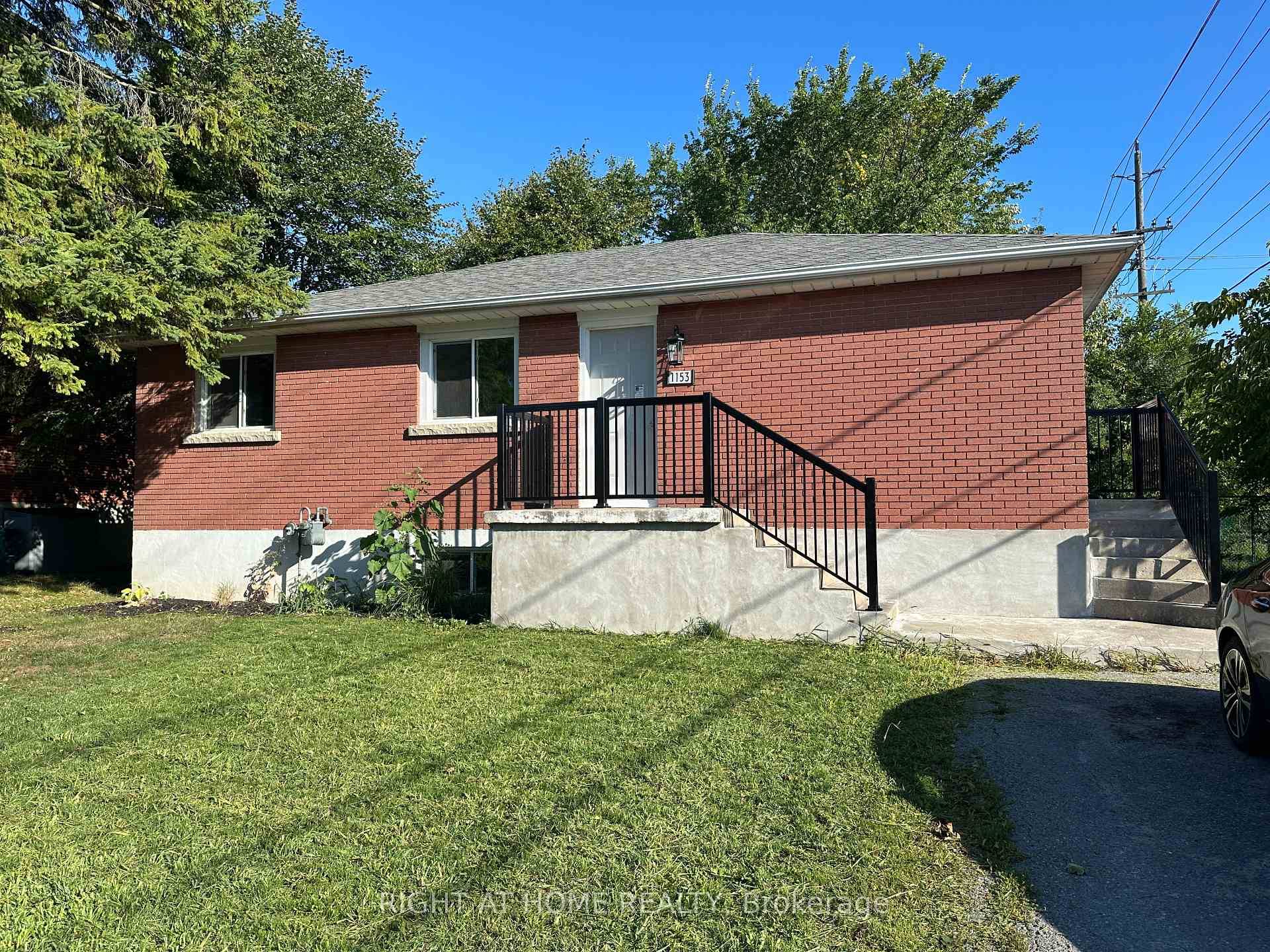 Welcome to this beautifully remodeled raised bungalow in sought after Polson Park.