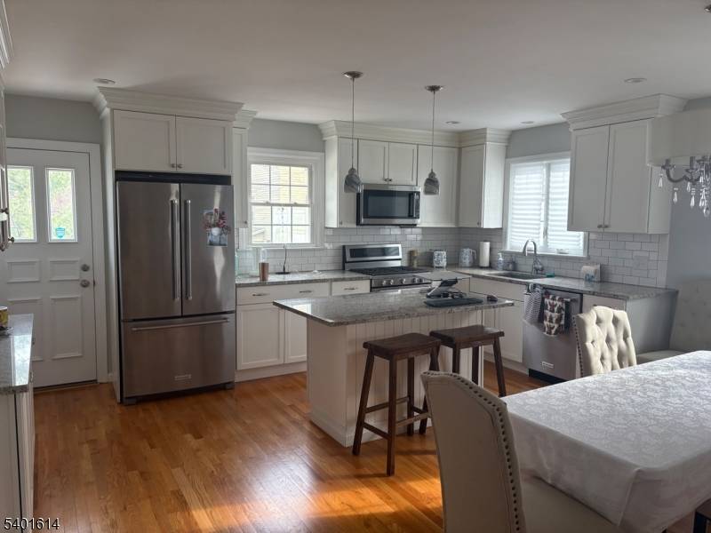 Pristine completely renovated ranch home with new kitchen and baths.