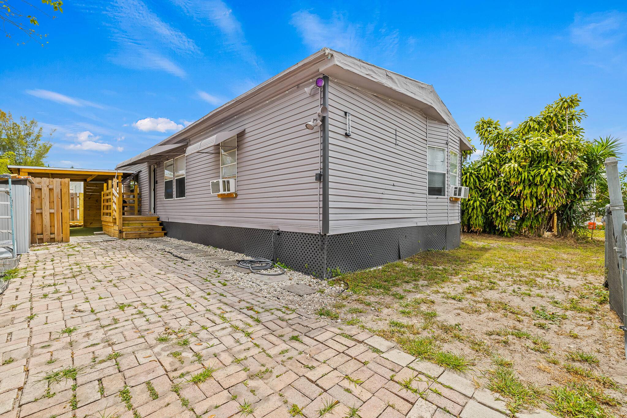 INVESTORS ONLY. Affordable and stylish manufactured home in sought after Watergate, where you own both the land and the home.