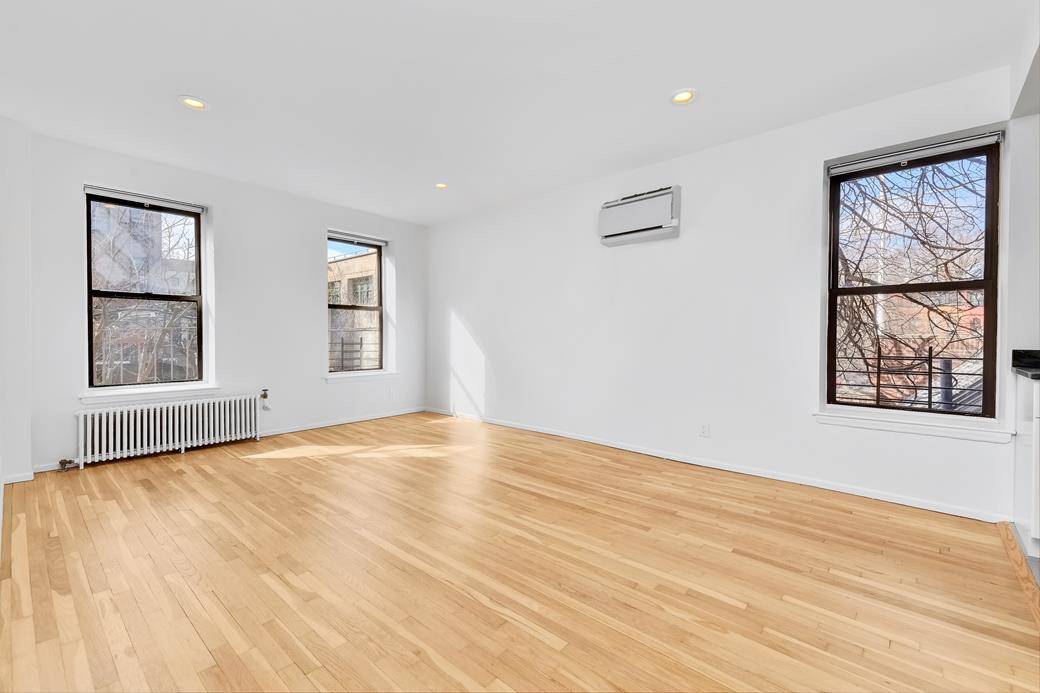 Be the first person to live in this renovated true 1 bedroom corner apartment bathed in southern sunshine !