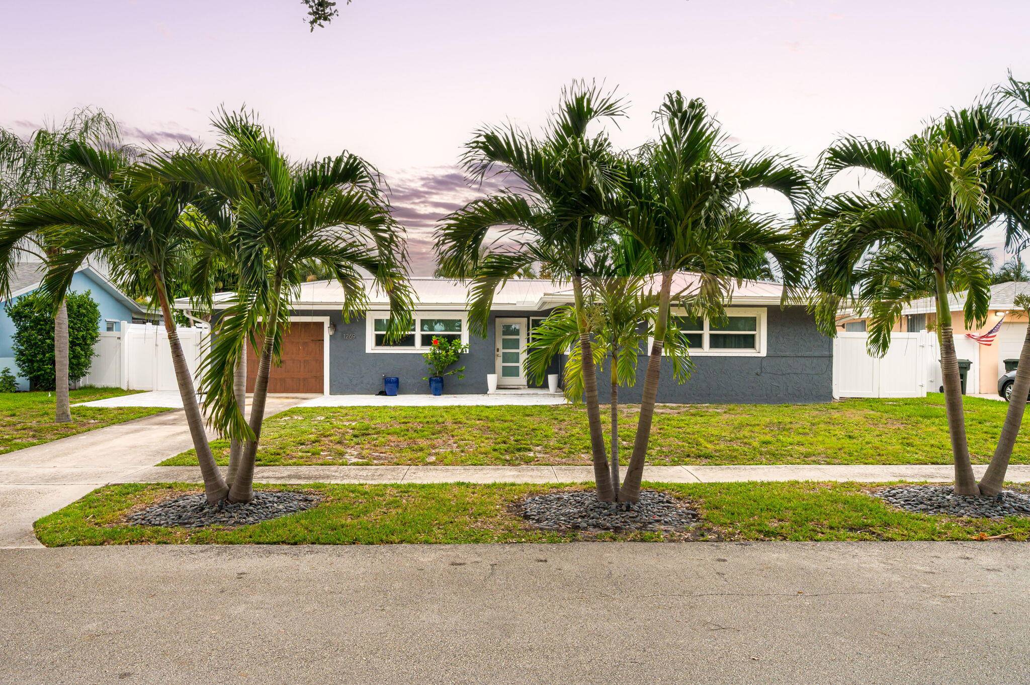Beautifully Updated Pool Home in Highly Sought After Boca Raton Square !